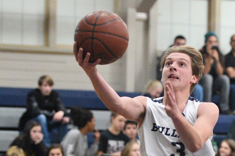 Blake Darr drives for a layup in Grangeville's win over Pomeroy
